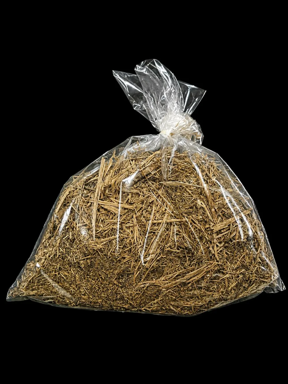 Tied bag of chopped golden gesho stems
