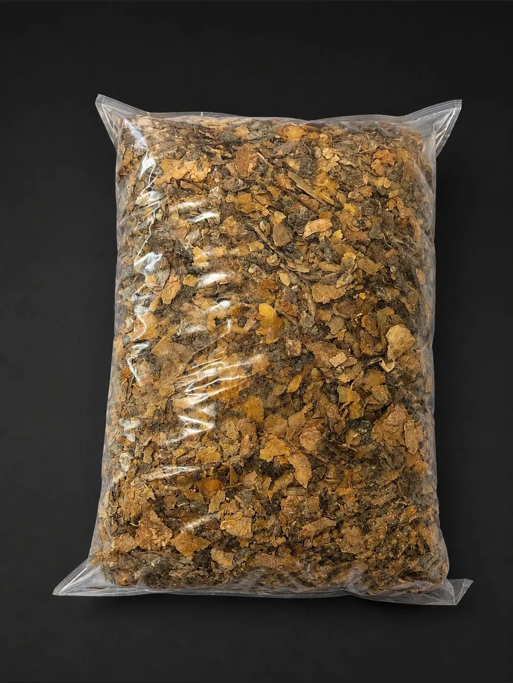 Bag of mixed incense resin flakes and bark chips