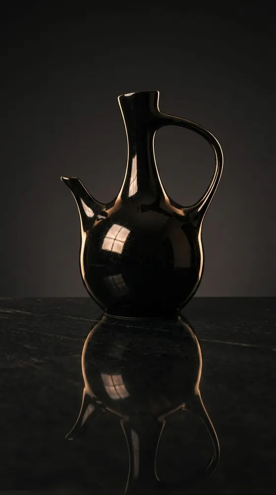 Black glazed Ethiopian jebena coffee pot