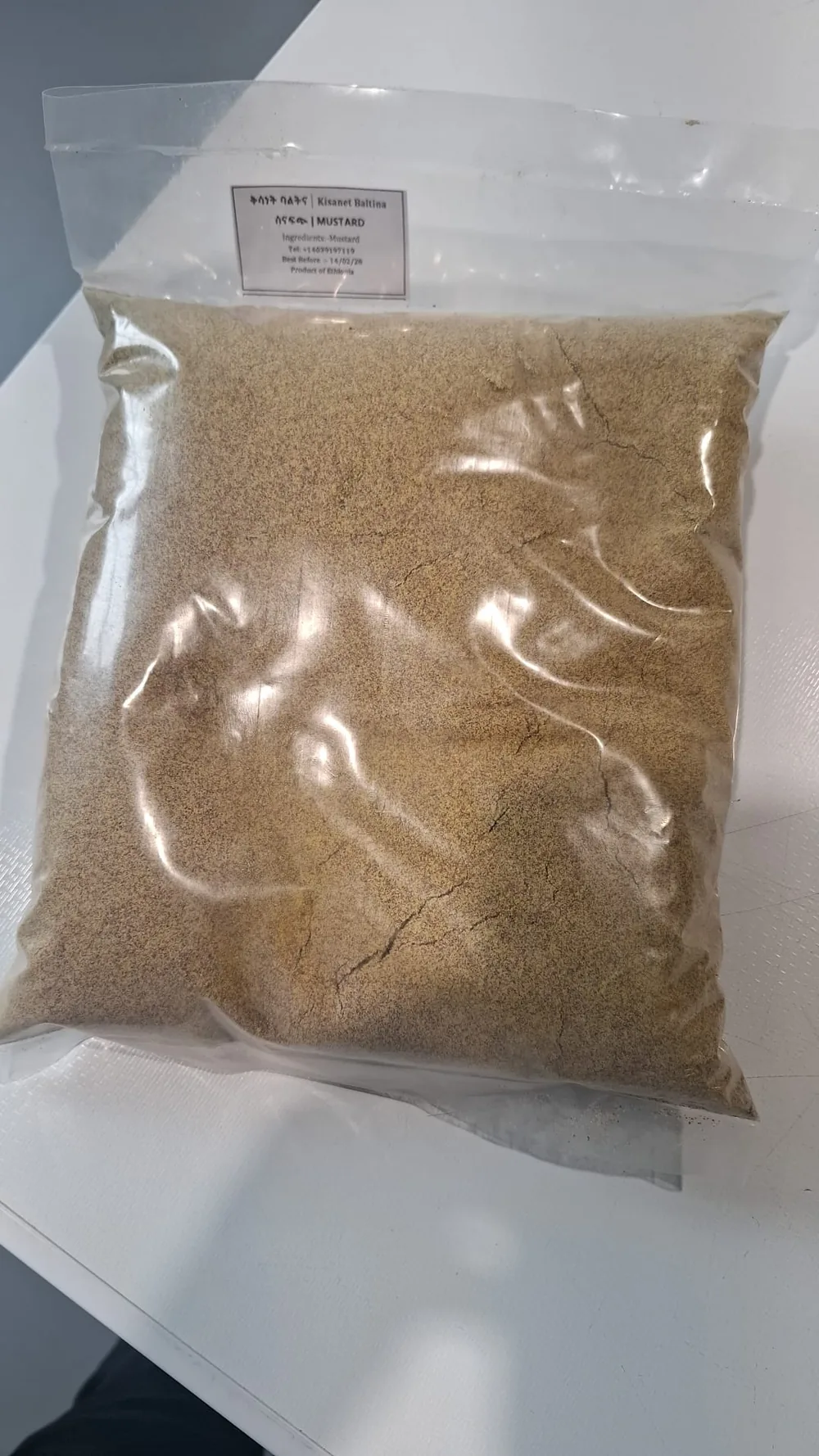 Sealed 1 kg bag of Berbere pepper powder, Kisanet Baltina label